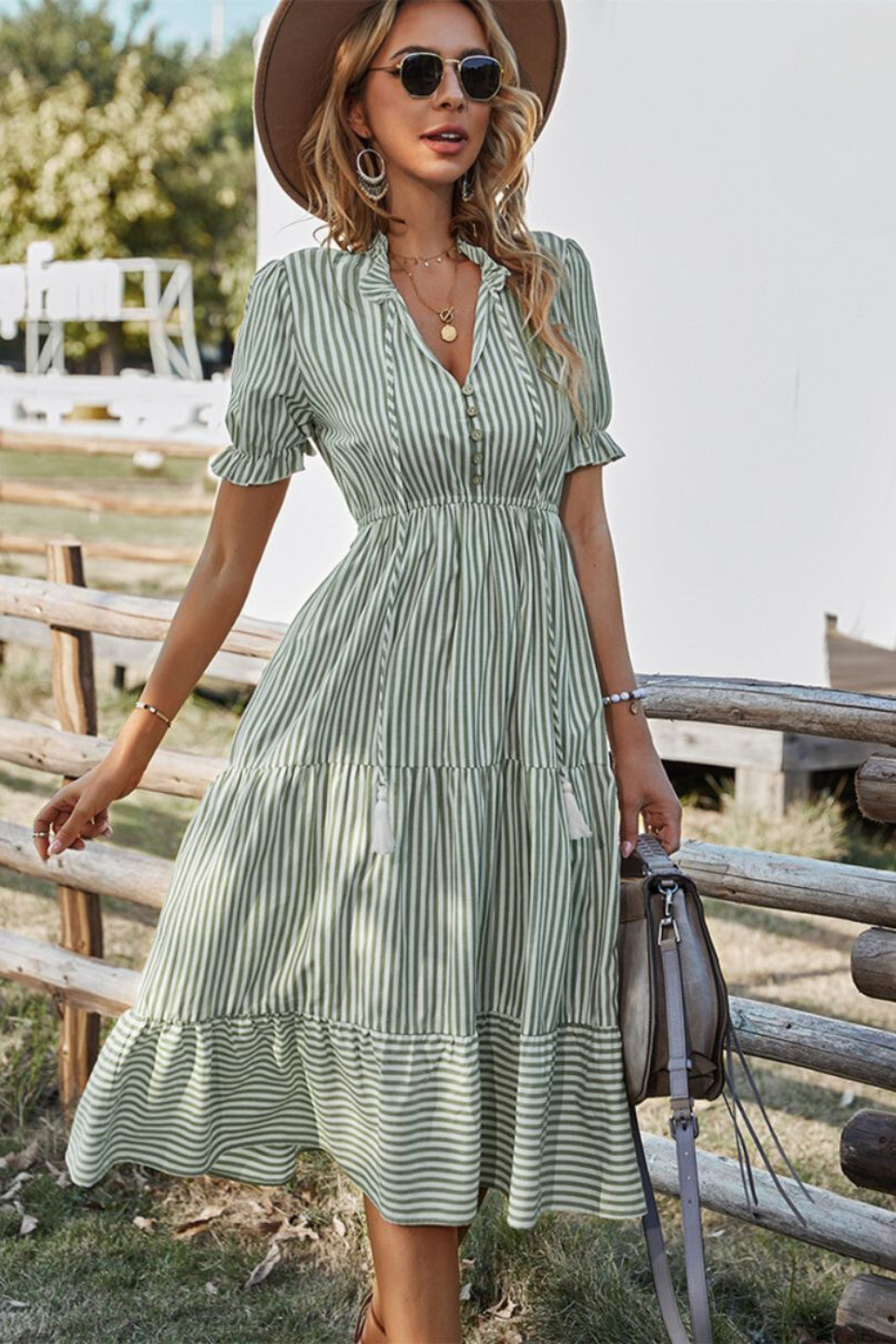 Damen gestreiftes Midikleid mit V-Ausschnitt und Quasten